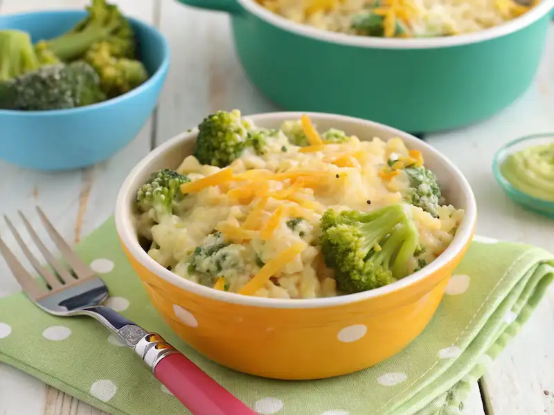 Cheesy Broccoli Rice Casserole, a comforting toddler dinner idea with gooey cheese, tender rice, and finely chopped broccoli—perfect for picky eaters.