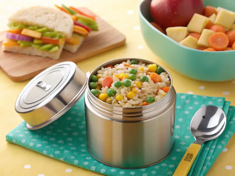 "Veggie fried rice in a thermos – a warm, colorful, and budget-friendly lunch option for kids."